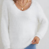 A soft, cozy, fluffy white V-neck sweater with long sleeves, perfect for winter wear.