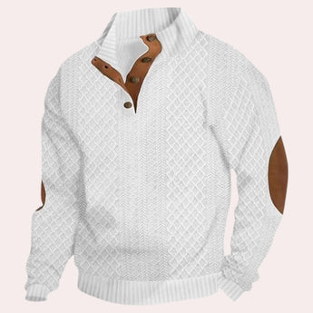 Men's forest green wool cable knit sweater with elbow patches, featuring a crew neck and long sleeves.