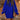 Forest green oversized cable knit sweater dress featuring a cozy turtleneck design, shown in a blue color variant in XL size. The dress highlights a loose fit with long sleeves and a distinctive cable knit pattern.