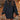Forest green oversized cable knit sweater dress with a cozy turtleneck design, featuring long sleeves and a relaxed fit that extends to knee length.