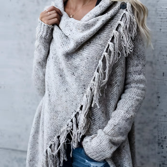 A 2XL gray fringed Bohemian wool cowl neck sweater with long sleeves, displayed on a mannequin, showcasing chic winter knitwear styling.