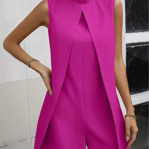 Fuchsia asymmetrical sleeveless high-neck tunic in magenta, designed for plus-size women, featuring a sleek sheath silhouette.