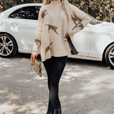 A beige XL fuchsia ethnic pattern sweater featuring boho chic embroidery, displayed with emphasis on its intricate design.