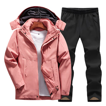 Men's fuchsia hooded track jacket in pink, size XXL, featuring a collar and long sleeves, paired with black moisture-wicking pants.