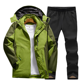 Men's green hooded track jacket with black moisture-wicking pants, featuring long sleeves and a collar, suitable for sportswear or workwear.
