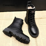 Black women's winter combat boots featuring a fur-lined interior for insulation and a high-traction sole.