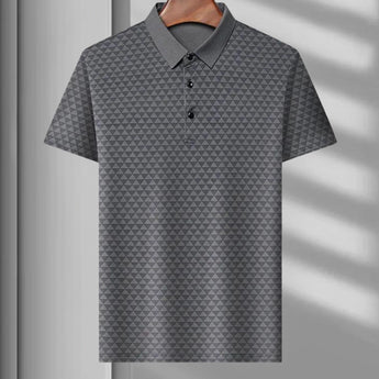 Men's polo shirt featuring a geometric blue triangle pattern, in gray color and size XL, with short sleeves and a classic collar design.