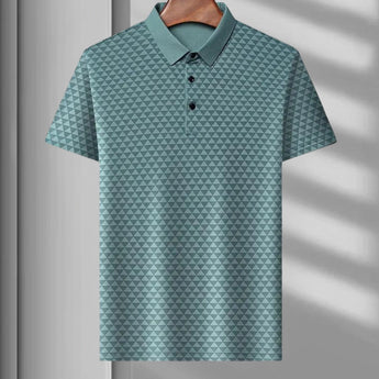 Men's polo shirt with geometric blue triangle patterns, featuring a traditional collar and short sleeves; available in green color variant, size XL.