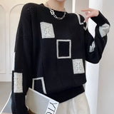 Geometric black and white checkerboard knit crewneck sweater for women, featuring long sleeves, designed in 2XL size.