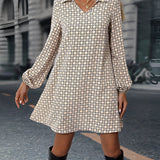 Woman wearing a beige geometric print long sleeve mini dress, showcasing casual chic fall fashion.