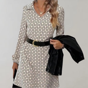 Geometric print V-neck long sleeve midi dress in black, featuring a chic office wear design with a fitted waist and stylish pattern.