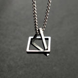 Modern minimalist necklace featuring a geometric silver square frame pendant on a delicate chain.