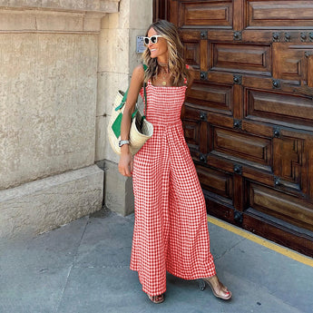 Sleeveless red gingham wide-leg jumpsuit in size XL, featuring a checkered pattern, perfect for summer fashion.