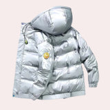 Glossy black designer puffer jacket with a luxurious hood, featuring a sleek silver finish in size 4XL. The jacket includes long sleeves, a high collar, and button details for sophisticated outerwear.