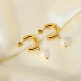 Gold Crescent Pearl Drop Earrings with elegant design, featuring luxurious gold finish, pearl drops, and modern styling, ideal for weddings and bridal accessories.