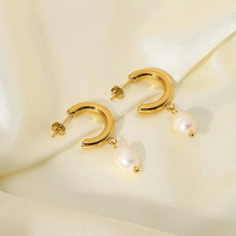 Gold Crescent Pearl Drop Earrings with elegant design, featuring luxurious gold finish, pearl drops, and modern styling, ideal for weddings and bridal accessories.