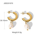 Elegant gold crescent pearl drop earrings with luxurious design, featuring a modern aesthetic with high-quality materials, perfect for adding sophistication to any outfit.