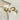 Gold Crescent Pearl Drop Earrings with a modern luxury design, featuring a gold crescent shape adorned with elegant pearl drops.