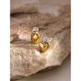 Gold Crystal Heart Stud Earrings – 18K Plated, Romantic Gift, showcased on a wooden surface.