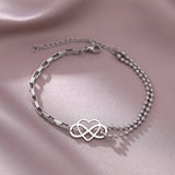 Elegant Gold Heart Charm Bracelet featuring an adjustable chain, dainty design, and heart-shaped charm, perfect as a jewelry gift.