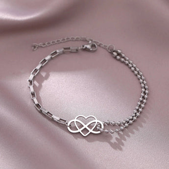 Elegant Gold Heart Charm Bracelet featuring an adjustable chain, dainty design, and heart-shaped charm, perfect as a jewelry gift.