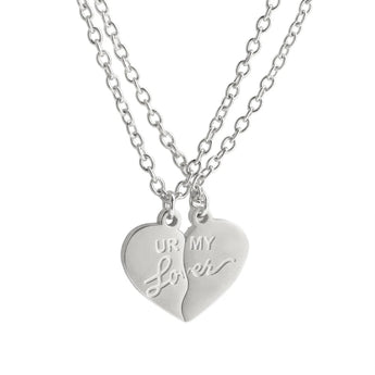 A silver-colored heart pendant necklace engraved with "UR MY Lover," presented as a Valentine's gift, displayed with a box.