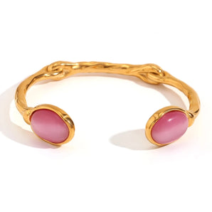 Gold Pink Cabochon Bracelet featuring luxurious design with pink cabochon gemstones set in gold, showcasing high-end craftsmanship and elegance for women.