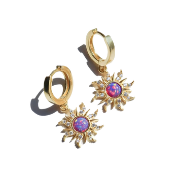 Gold sunburst earrings with pink opal, featuring celestial dangle hoops and intricate oval and circular designs.