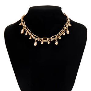 Gold teardrop necklace featuring an elegant bridal choker design with an adjustable pendant, crafted from natural materials and metal, ideal for special events.
