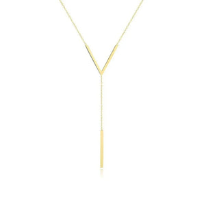 Gold V-Shaped minimalist necklace with a vertical bar pendant on a wooden surface.