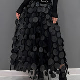 Gothic black high-waist layered circle skirt with an elegant, flowing design, showcasing alternative fashion style.