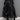 Gothic black high-waist layered circle skirt with a flowing design, showcasing an alternative fashion style.