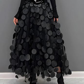 Gothic black high-waist layered circle skirt with a flowing design, showcasing an alternative fashion style.