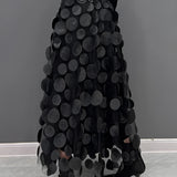 Black high-waist layered circle skirt, featuring a gothic alternative fashion style with a unique artistic pattern.