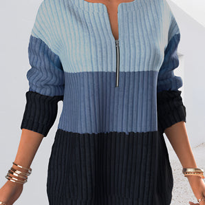 Gradient blue women's zip-front ribbed knit ombre sweater displayed on a white background, featuring long sleeves and a high neckline.