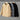 Gray corduroy men's urban winter jacket featuring a high collar and insulated interior, designed as outerwear with stylish sleeve and fashion design elements.