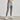 Gray men's tapered joggers in size 2XL, displayed on a model from waist to shoe, highlighting the lightweight fabric and athletic fit.