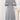 Gray plus size midi dress featuring a tie-waist and button-front design, ideal for casual work settings. The dress is modeled by a person, showcasing its one-piece garment style with focus on the shoulder and neck areas.