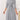 Gray plus size midi dress with a tie-waist and button-front design, featuring long sleeves and a sleek silver gray color in 2XL, suitable for casual work settings.