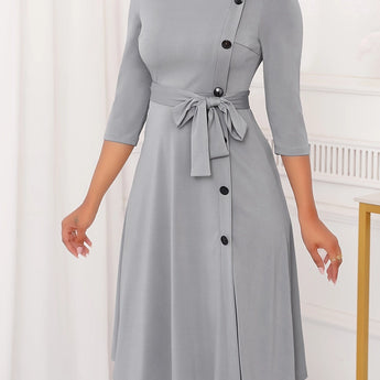 Gray plus size midi dress with a tie-waist and button-front design, featuring long sleeves and a sleek silver gray color in 2XL, suitable for casual work settings.