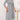 Gray plus size midi dress with tie-waist and button-front design, featuring long sleeves and tailored for a casual work setting.