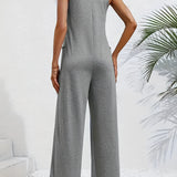 Gray sleeveless wide-leg jumpsuit showcasing a casual summer style, featuring a flattering waistline and a comfortable one-piece design.