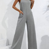 Gray sleeveless wide leg jumpsuit with a casual summer design, featuring a relaxed fit and a comfortable neckline.