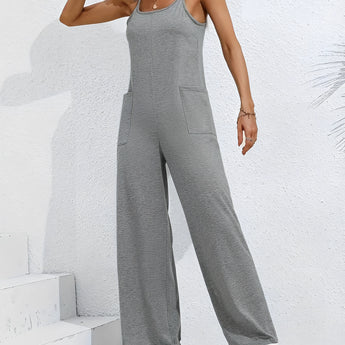 Gray sleeveless wide leg jumpsuit shown on a model, highlighting the comfortable fit and casual summer style.