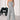 Woman wearing a gray sleeveless casual wide leg jumpsuit, standing, summer loungewear, size XL.