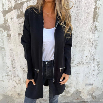 Gray women's long cardigan with zippered pockets, featuring a modern design suitable for fall fashion, shown in black color, XXL size. The cardigan has long sleeves and a comfortable fit, ideal for layering over other clothing items.