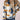 
A woman wearing a stylish winter outerwear in the form of a green Aztec print zip-up bomber jacket. She pairs the jacket with jeans and has a casual hairstyle. The jacket features long sleeves and is designed for comfort and warmth. The variant shown is in blue and size 2XL.