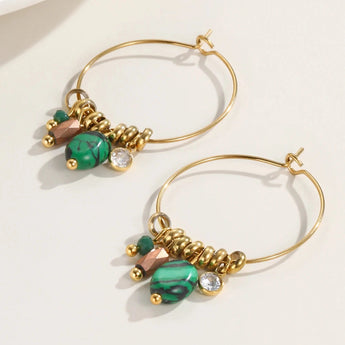 Elegant green crystal gold hoop earrings by YA-CHAN Luxury Designer Jewelry, featuring natural gemstone accents and fine metal craftsmanship.
