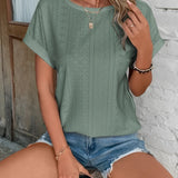 Green eyelet short sleeve blouse with laser cut details, breathable fabric, trendy fashion in size 2XL.