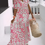 Green floral bohemian maxi dress with a V-neckline, featuring short sleeves and pockets, styled for resort wear in a Corallo Rosso1 pattern, size 3XL22.